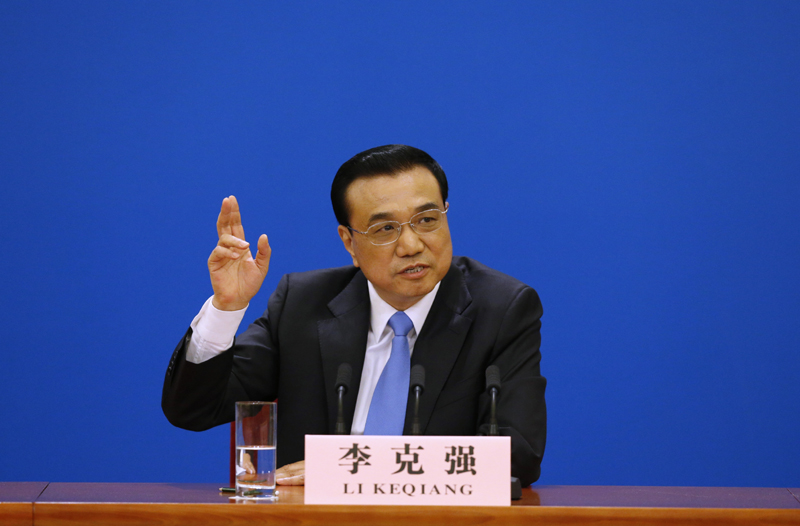 3月15日，國務(wù)院總理李克強在北京人民大會堂與中外記者見面，并回答記者提問。 新華社記者 沈伯韓 攝