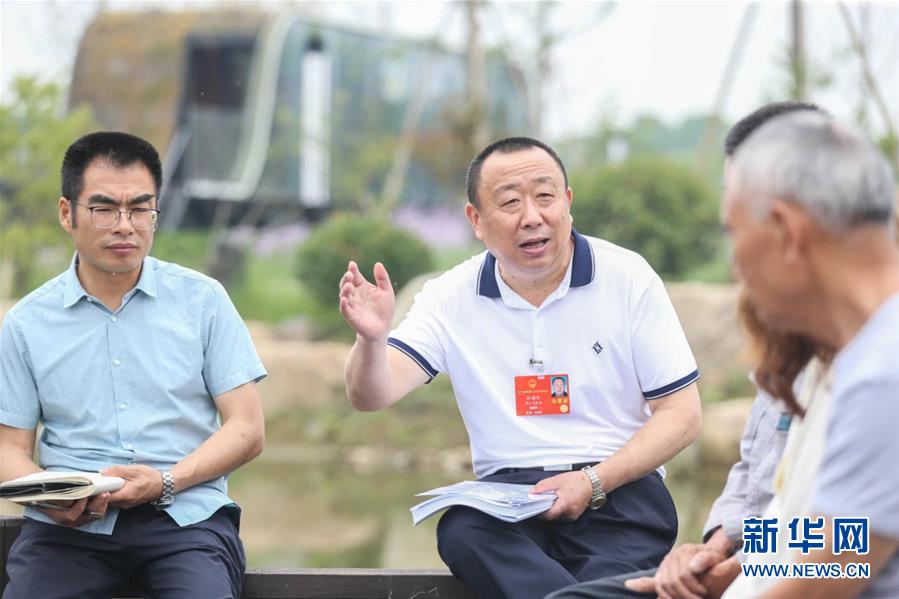 （新華全媒頭條·兩會精神看落實·圖文互動）（2）整體謀劃、系統(tǒng)升級、全面提升——落實全國兩會精神織牢織密公共衛(wèi)生防護網