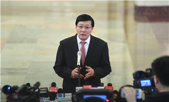 全國社?；鹄硎聲硎麻L樓繼偉接受采訪