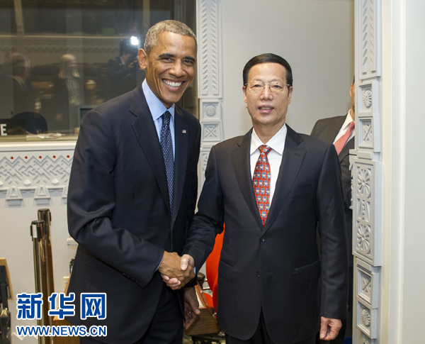 9月23日，國家主席習(xí)近平特使、國務(wù)院副總理張高麗在紐約會見出席聯(lián)合國氣候峰會的美國總統(tǒng)奧巴馬。 新華社記者王曄攝
