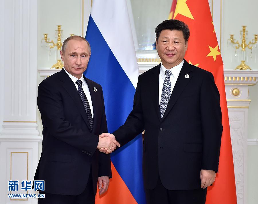 6月23日，國(guó)家主席習(xí)近平在烏茲別克斯坦塔什干會(huì)見俄羅斯總統(tǒng)普京。新華社記者李濤攝